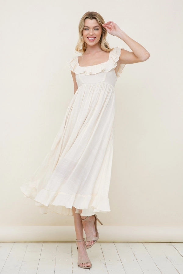 wholesale clothing ivory solid midi dress with pockets and ruffle details In The Beginning